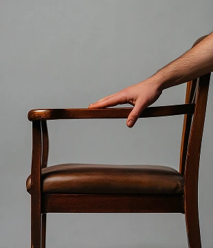 Cracked leather chair before repair